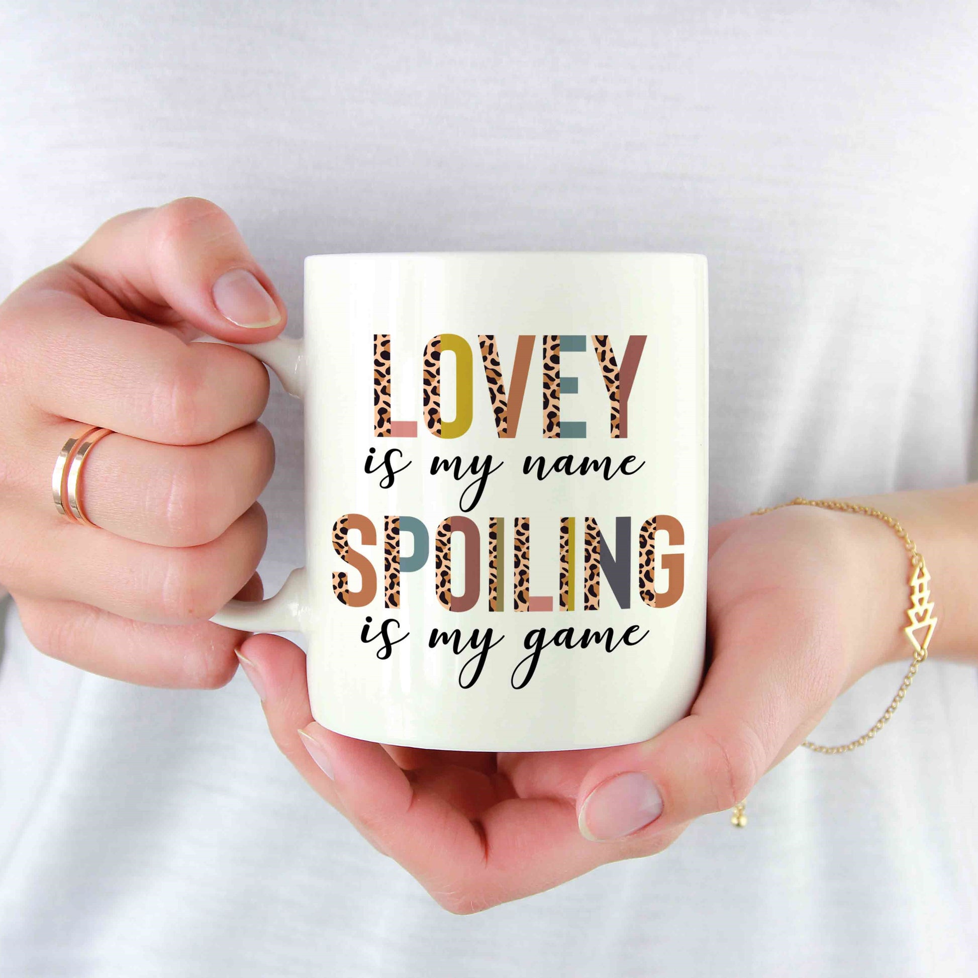 https://www.customizaholic.com/cdn/shop/files/2000042LoveyIsMyNameSpoilingIsMyGameMug_FunnyMugs_GiftforHer_GiftsforNana_Mother_sDayGifts_CustomNameMugmk1.jpg?v=1689578905&width=1946